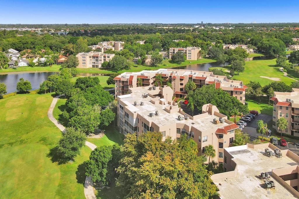 Photo of 9520 Seagrape Dr #302, Davie, FL 33324 (MLS # F10433485)