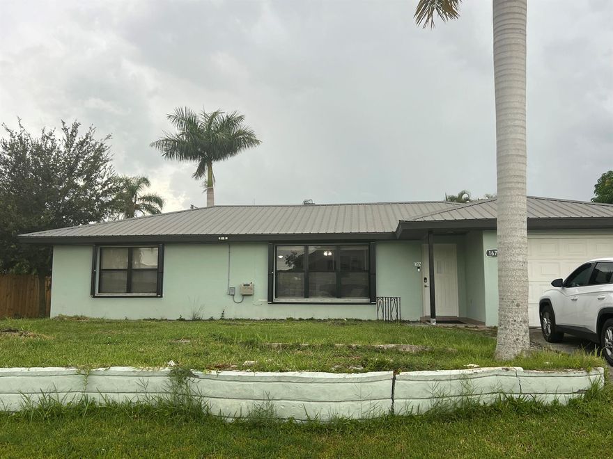 Check out this well kept 3/2/1 CBS home in Port St Lucie.  Kitchen has been updated with white cabinets and granite countertops.  This home offers tile throughout. Both bathrooms are also newly redone. Enjoy your own private covered patio with large backyard. Close to turnpike for commuters. Close to shopping and restaurants .Tenant responsible for lawn maintenance. Available December 15, 2025