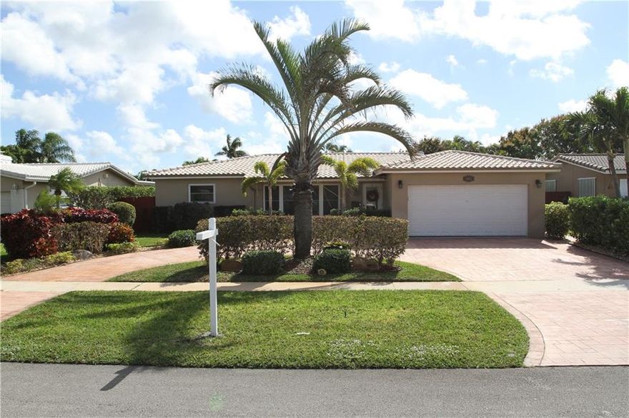 HLWD HILLS BEAUTY.LOADED W/UPGRADES.IMPACT WDWS.CROWN MOLDING.UPGRADED APLCES.BUILTINS GALORE.TANKLESS HOT WATER HTRS(2).POOL RESURFACED 2016 W/10 YEAR WARRANTY.NEW ELECTRIC INSIDE AND OUT NEW PANELS.NEW HVAC 2016.15 NEW HIGH HATS INSTALLED.ILLUMINATED COFFERED CEILING IN DING ROOM. CONVERTIBLE FAM ROOM W/BUILT INS AND LAUNDRY STATION (GE DUET UPRIGHTS) CURRENTLY USED AS ADDT'L DINING AREA. HUGE LANAI WITH ACCESS TO ALLEY. NEW LANDSCPING NEW FLOORING THROUGHOUT. BABY FENCE FOR POOL.PAVERS.MUCH MORE!