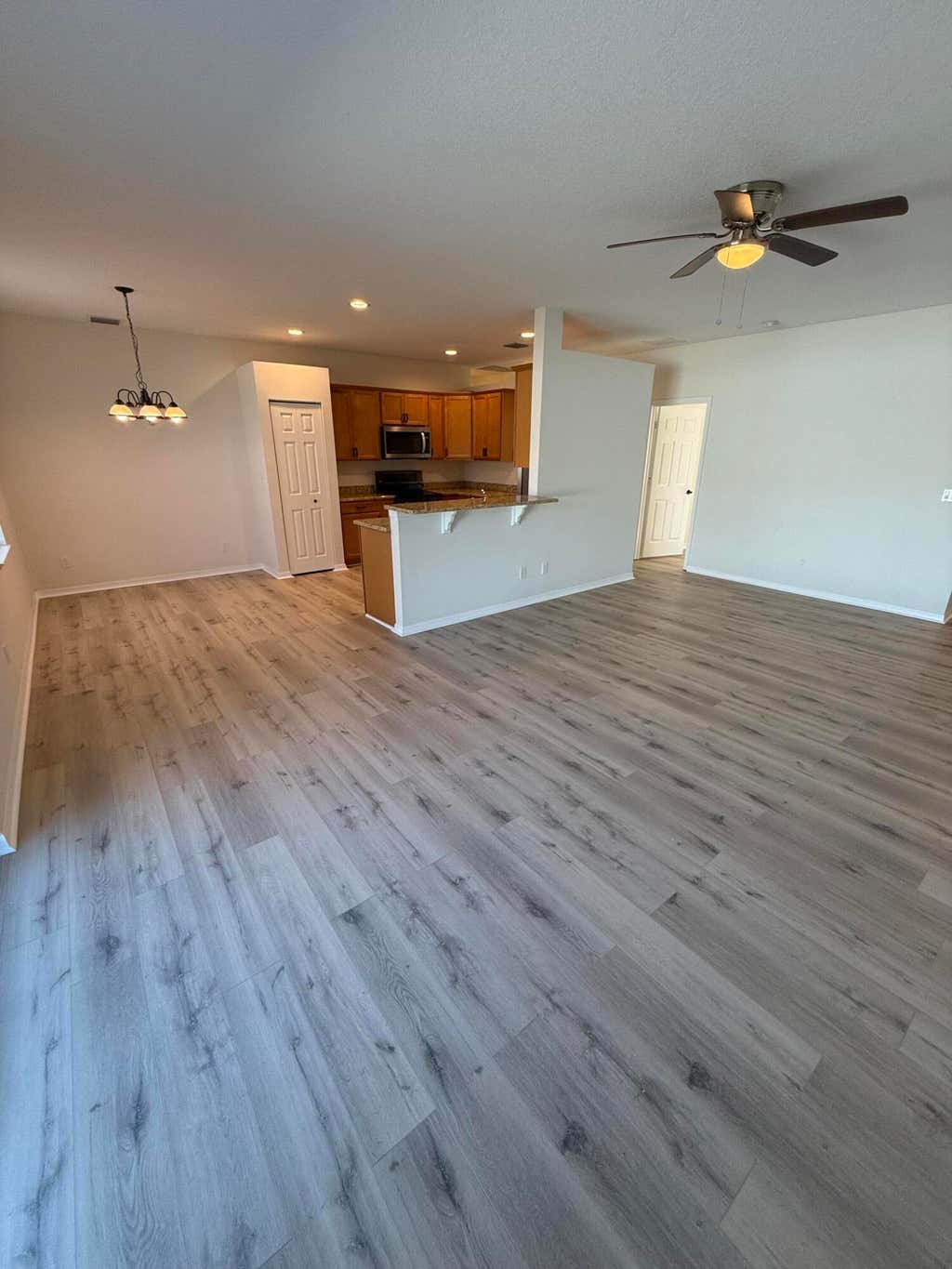 Photo of 1215 SW Ermine Avenue, Port Saint Lucie, FL 34953 (MLS # R11057539)