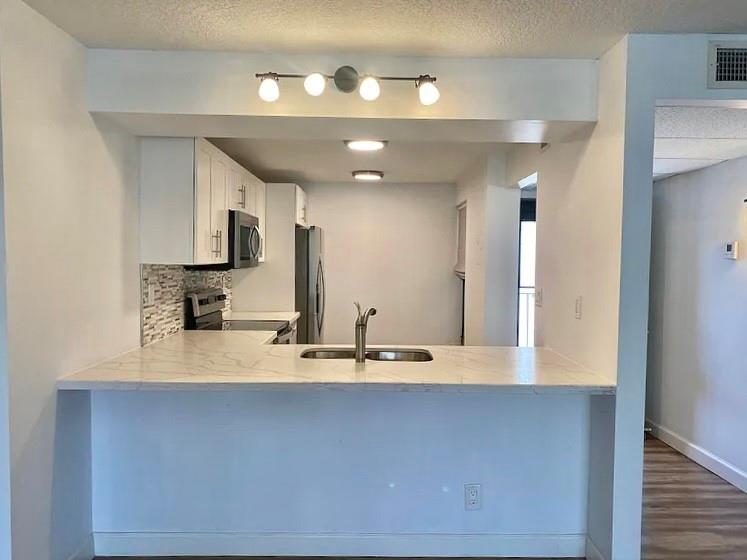 11 Royal Palm Way 303