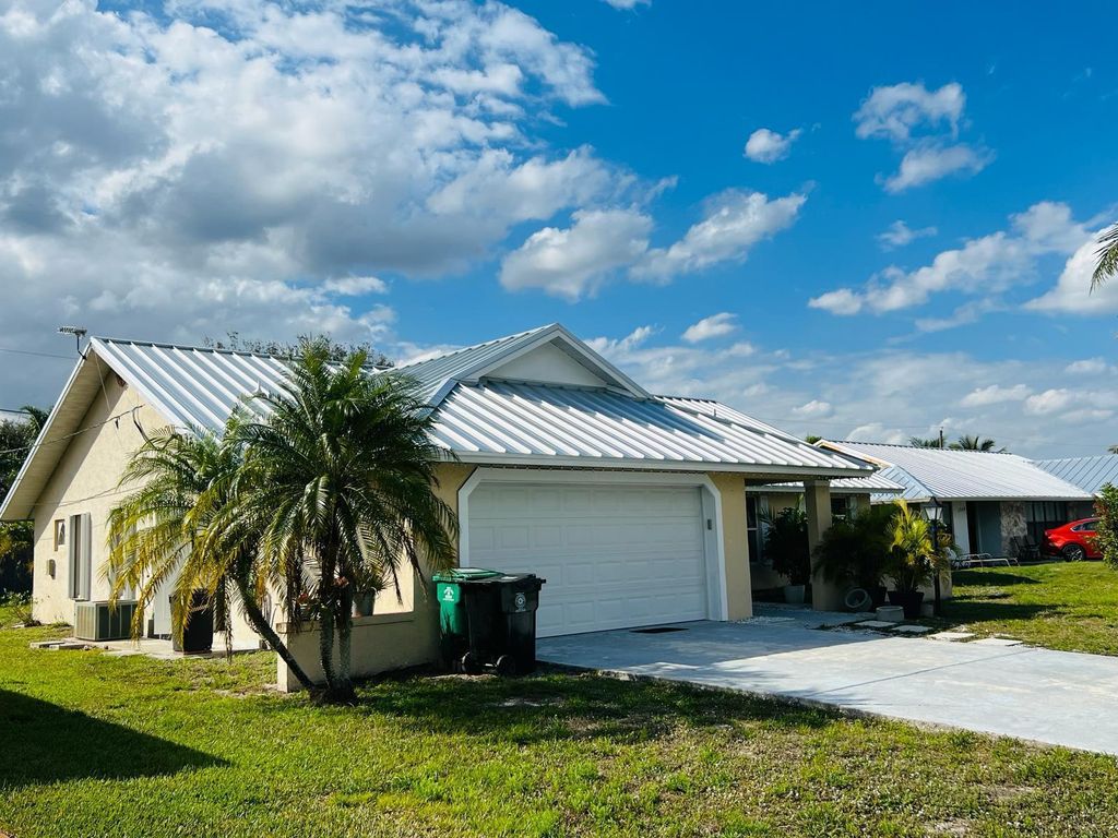 Photo of 1550 SE Croquet Street, Port Saint Lucie, FL 34983 (MLS # R10959181)