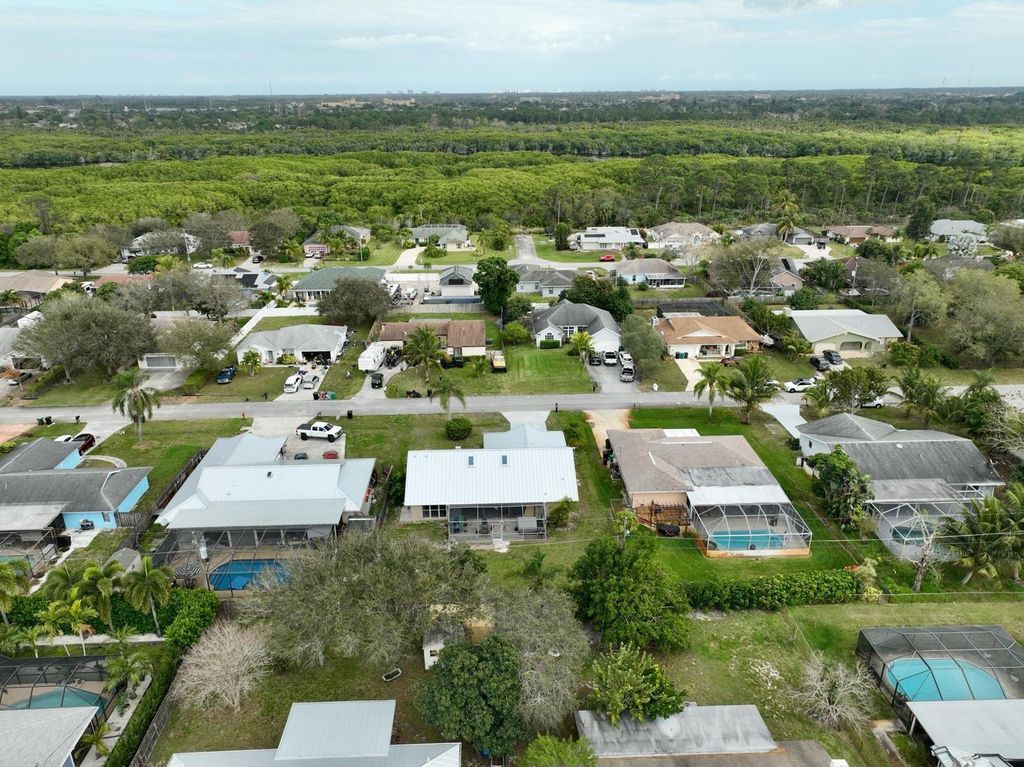 Photo of 1550 SE Croquet Street, Port Saint Lucie, FL 34983 (MLS # R10959181)