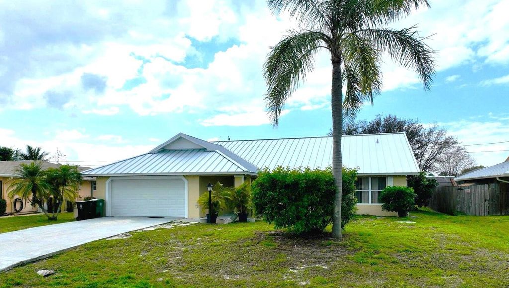 Photo of 1550 SE Croquet Street, Port Saint Lucie, FL 34983 (MLS # R10959181)