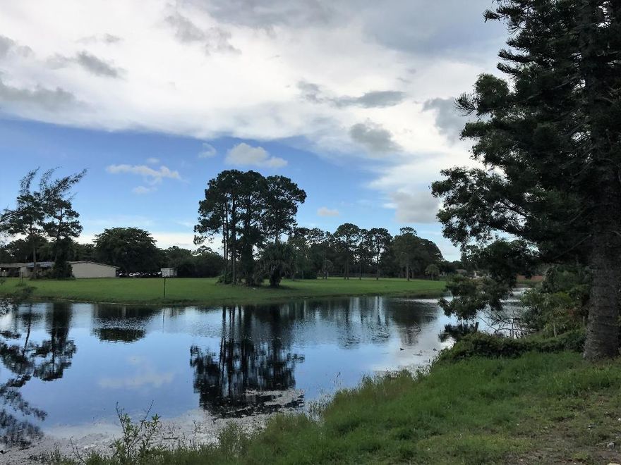 Own one of the best lots in Cannongate with large yard and backyard waterfront lake access and views. Features 2 bedrooms and 2 full bathrooms with laundry room and covered screened patio.