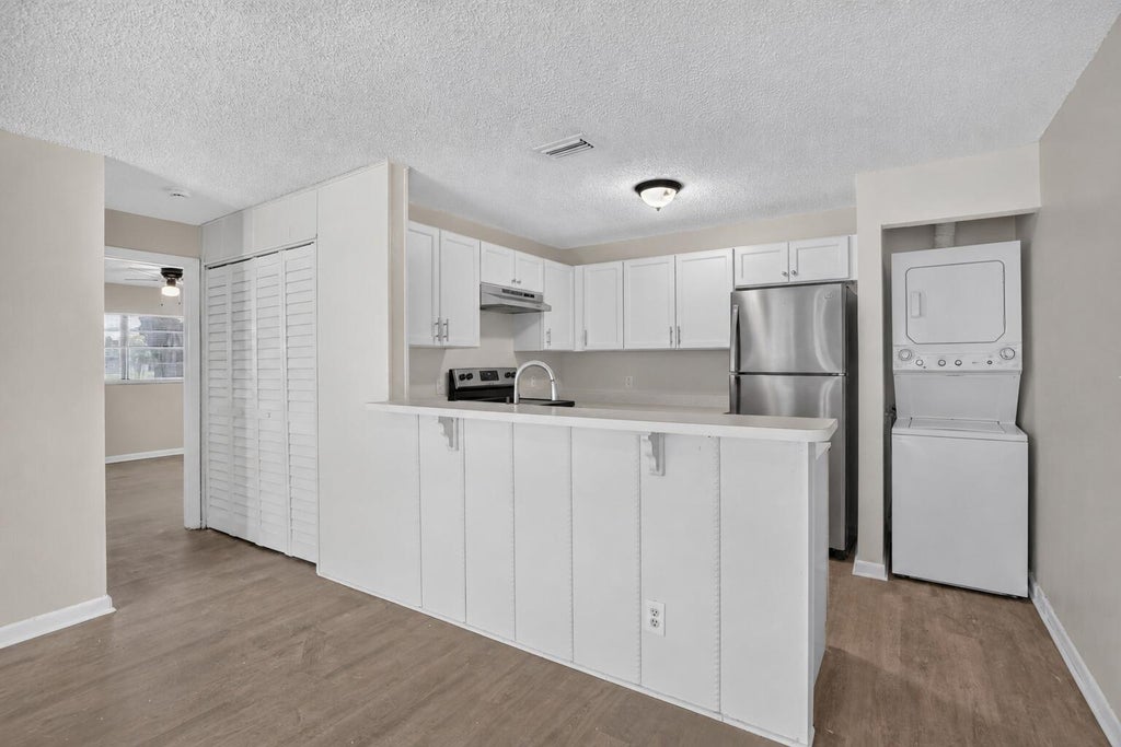 Photo of 9426 NW 49th Place #13d, Sunrise, FL 33351 (MLS # B26079457)