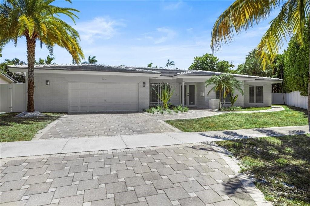 Welcome to this beautifully maintained 4-bedroom, 3-bathroom home, featuring an attached 2-bedroom, 1-bathroom mother-in-law suite—ideal for family, guests, or rental income (6 bedrooms 4 baths in total). This home boasts an open floor plan with two generous living spaces, modern kitchen, and dining area perfect for gatherings. The attached guest suite has a private entrance, comfortable living area, two bedrooms, and full bath—offering privacy while still being attached to the main residence. Connecting door could be added to access the main house directly if desired. Additional highlights include: Large backyard, impact windows and doors, new roof, updated appliances and marble floors, and ideal location near schools, parks, shopping, & major commuter routes