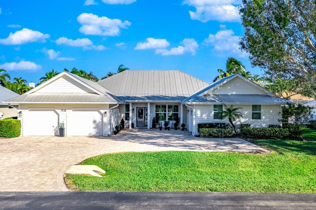 Photo of 1928 SW Hunters Club Way, Palm City, FL 34990 (MLS # R11044123)