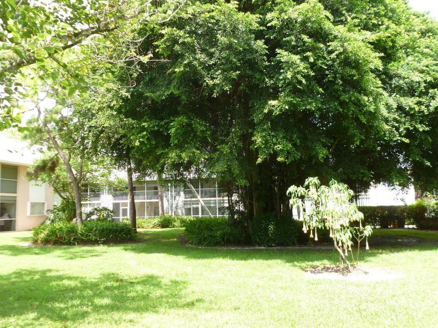 Located adjacent to Jonathan Dickinson State Park, this first floor, corner apartment is furnished if desired.  Updated in 2006 with ceramic tile floors in main living areas and carpet in the bedrooms. The AC was replaced in 2020 as was the hot water heater.  The roof was replaced in 2023 and the assessment has been paid.  Community activities include a nine hole golf course, tennis/pickel ball courts, shuffle board, bocci ball, a large swimming pool, a Club House with a library, Billiards table, craft room. This 55+ community has something for everyone. Visit the Coastal Property Management web site--The Little Club for further information. NOTE; 1/2 TO 3/4 TON TRUCKS NOW ALLOWED.