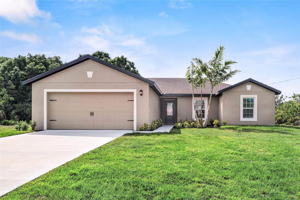 Photo of 4202 SW Jame Street, Port Saint Lucie, FL 34953 (MLS # F10448783)