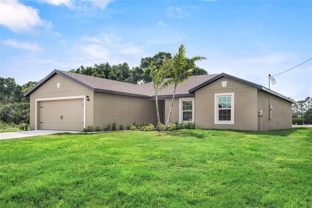 Photo of 4202 SW Jame Street, Port Saint Lucie, FL 34953 (MLS # F10448783)