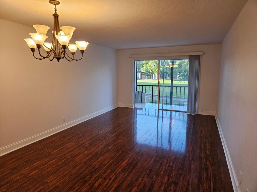 Photo of 8000 S Colony Cir #207, Tamarac, FL 33321 (MLS # B26010447)