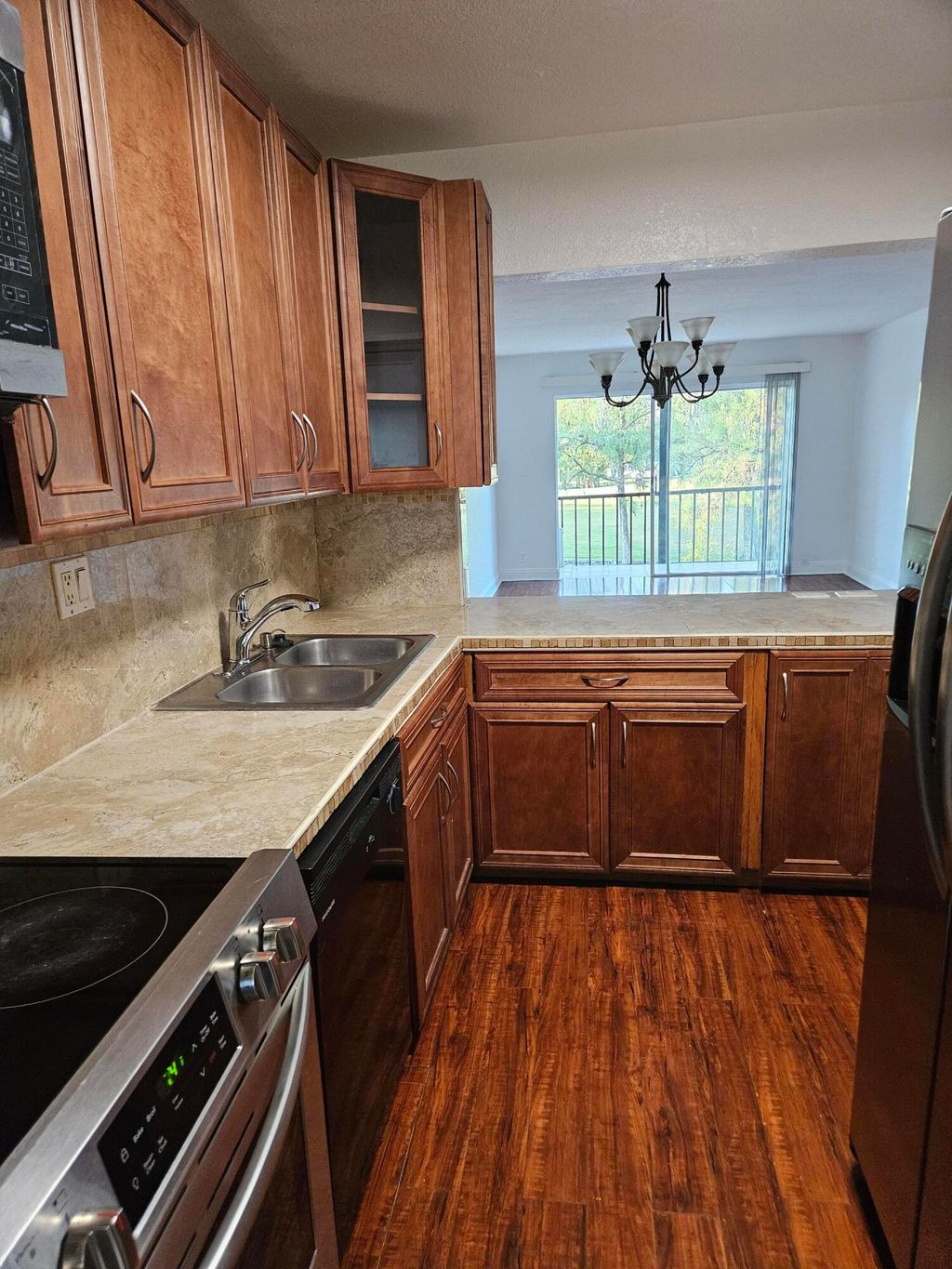 Photo of 8000 S Colony Cir #207, Tamarac, FL 33321 (MLS # B26010447)