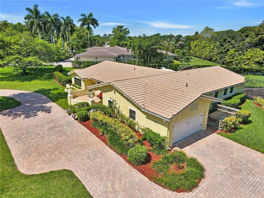 This custom built 5 bedroom + bonus room /3 bath estate home with pool and tennis court sits on nearly an acre of beautifully maintained land on a quiet cul-de-sac in desirable Running Brook Hills. This very bright triple split floor plan features a formal living room, family room and formal dining room.  The gourmet eat-in kitchen boasts granite countertops, a butcher block island and white cathedral cabinets with gorgeous views of the pool. Solid wood beams highlight the open concept family room and kitchen. Mother-in-law suite with connecting full bathroom has a separate entrance. Additional 6th room for office/den holds many possibilities! Solar panels for water heater and pool.  Expansive circular driveway, excellent schools and no HOA.