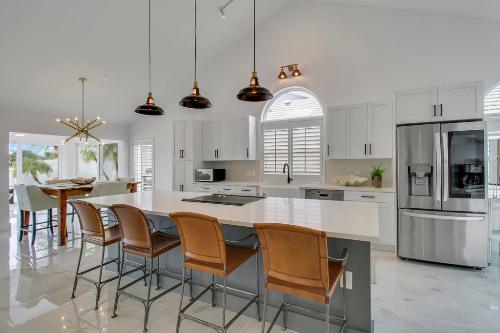 Photo of 2308 SARATOGA BAY Drive, West Palm Beach, FL 33409 (MLS # B26092953)