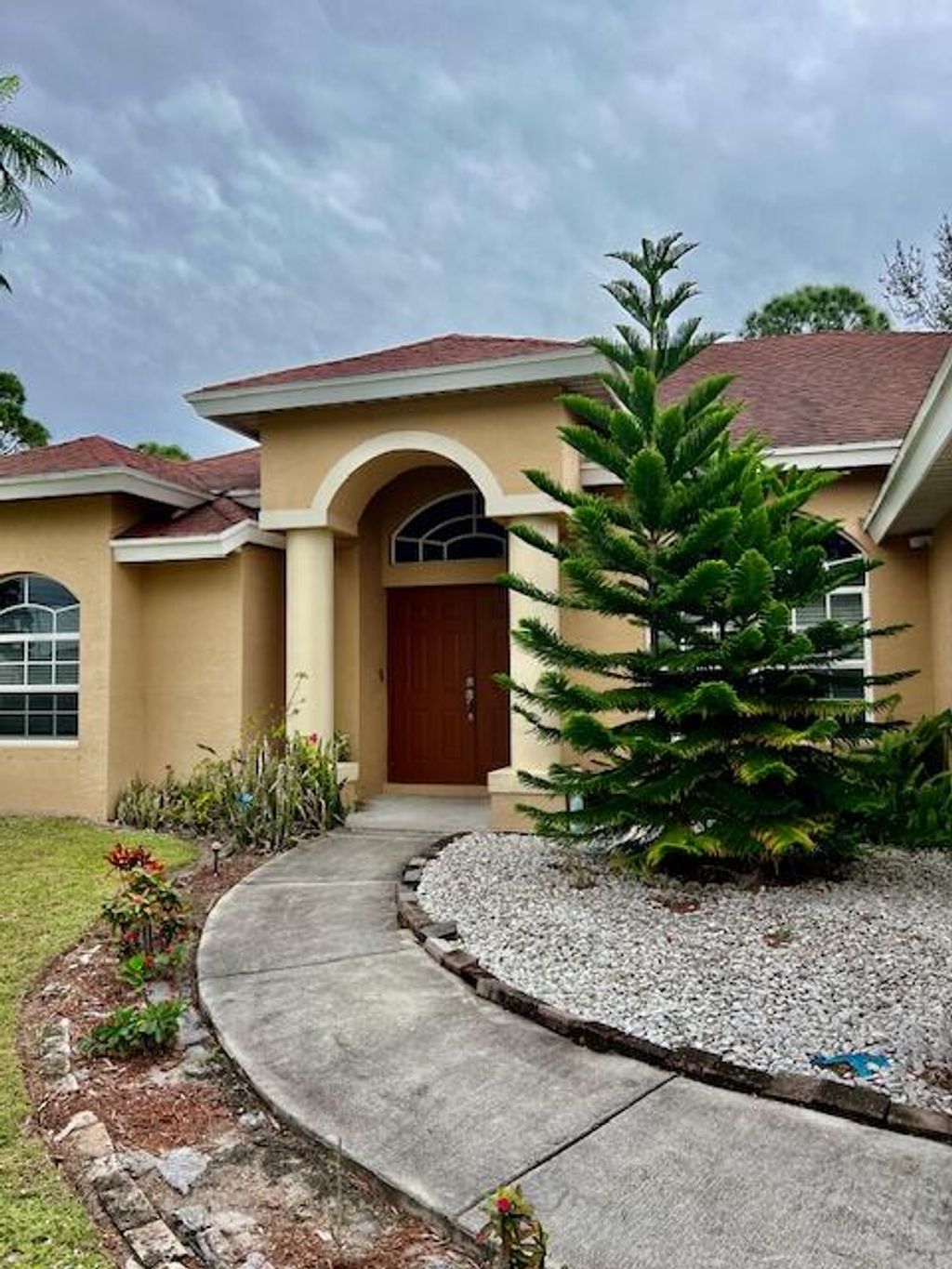Photo of 2471 SW Madiera Street, Port Saint Lucie, FL 34953 (MLS # R10943141)