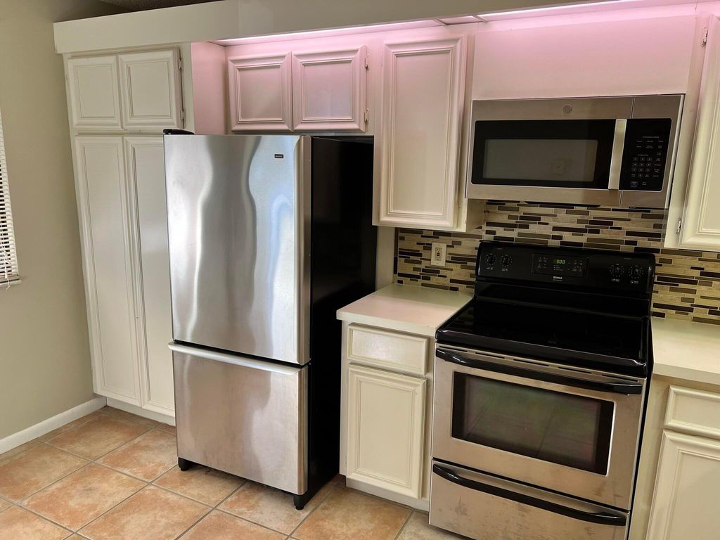 Photo of 2441 Village Boulevard #102, West Palm Beach, FL 33409 (MLS # R10948479)