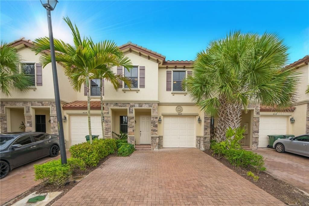 Photo of 4016 Devenshire Ct, Coconut Creek, FL 33073 (MLS # F10303093)