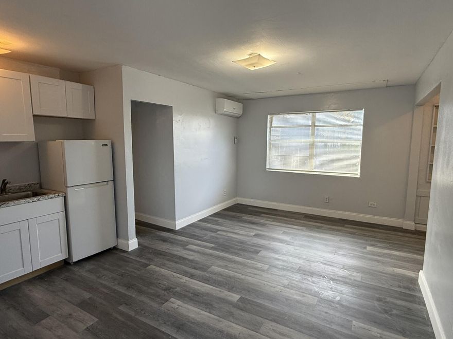 This large 2 bedroom, 2 bathroom unit also comes with a 3rd room that could be used for a small bedroom or office. Water is included in the price of the rent! Tile and vinyl flooring throughout. Spacious living room, new kitchen cabinets and a remodeled bathroom. There is coin laundry on site. This property is located one block North of the Blue Heron bridge. Close to West Palm and Downtown Palm Beach Gardens and Publix is walking distance. Fast approval process.  Need to see photo ID and one month of paystubs to arrange showings. Make an appointment to view this apartment today.Income needs to be $4500 per month combined.