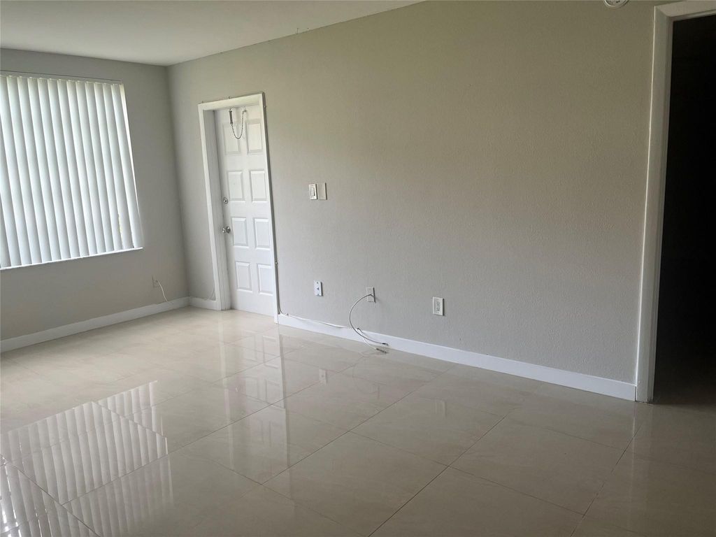 Photo of 1701 NW 75th Avenue #102, Plantation, FL 33313 (MLS # F10451240)