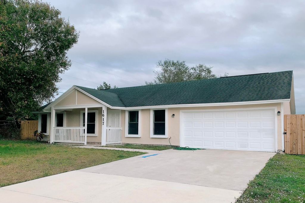 Photo of 1617 SW Clover Street, Port Saint Lucie, FL 34953 (MLS # R10769623)