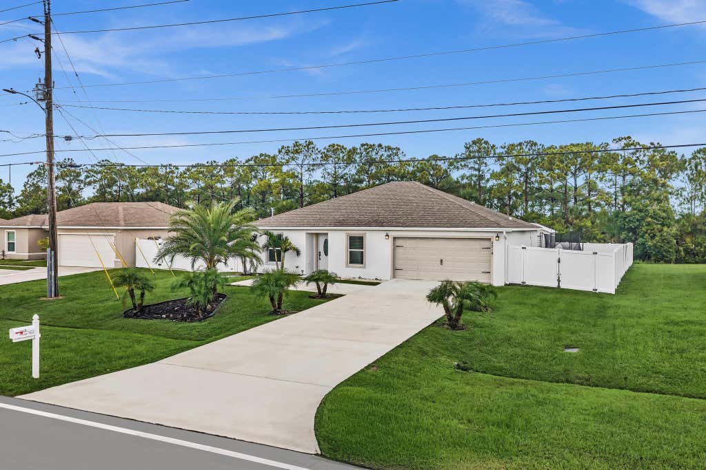 Photo of 2518 SW SAVAGE Boulevard, Port Saint Lucie, FL 34953 (MLS # B26061885)