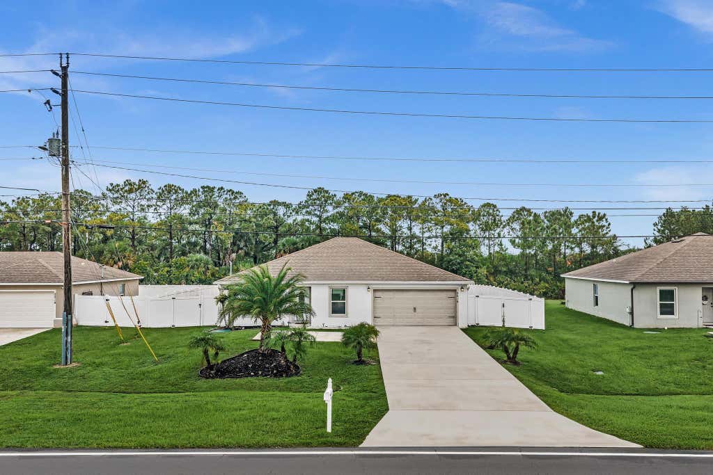 Photo of 2518 SW SAVAGE Boulevard, Port Saint Lucie, FL 34953 (MLS # B26061885)