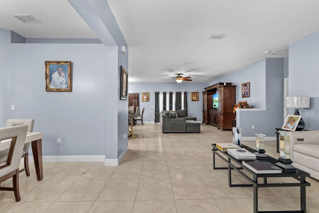 Photo of 1585 SW Merchant Lane, Port Saint Lucie, FL 34953 (MLS # R11160762)
