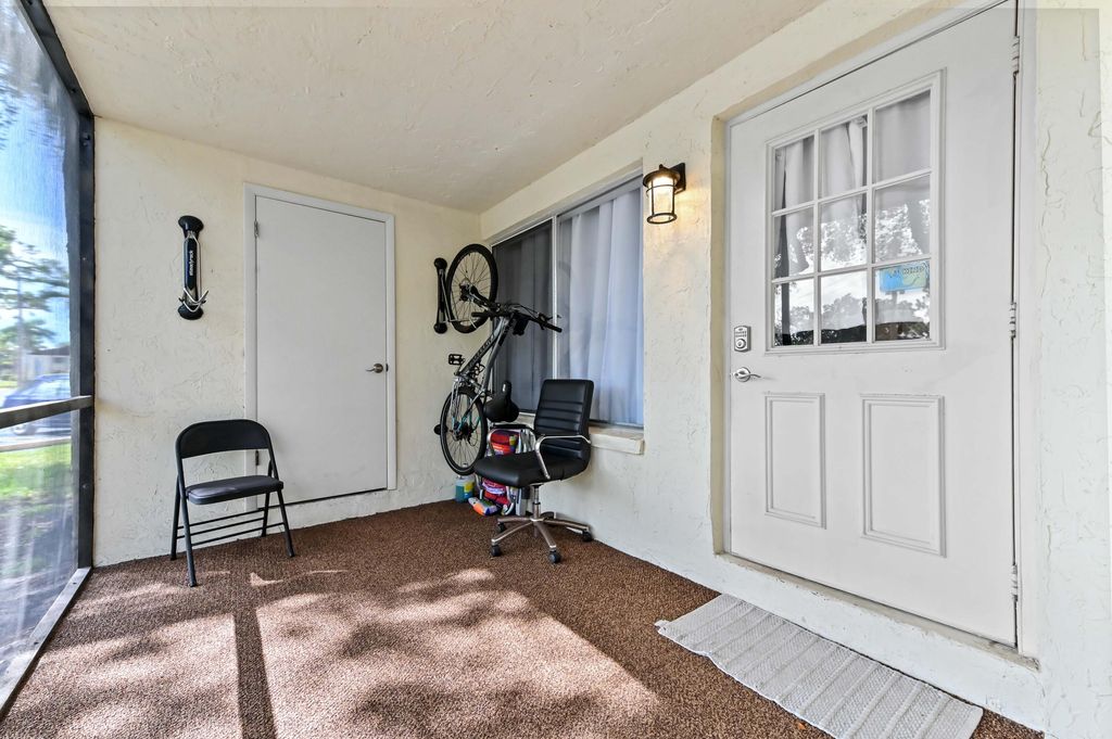 Photo of 121 Lake Pine Circle #A1, Greenacres, FL 33463 (MLS # R11103136)