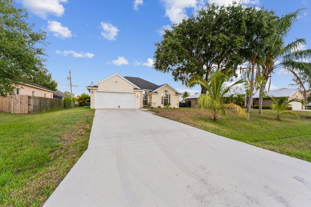 Photo of 1622 SW Realty Street, Port Saint Lucie, FL 34987 (MLS # R10982533)