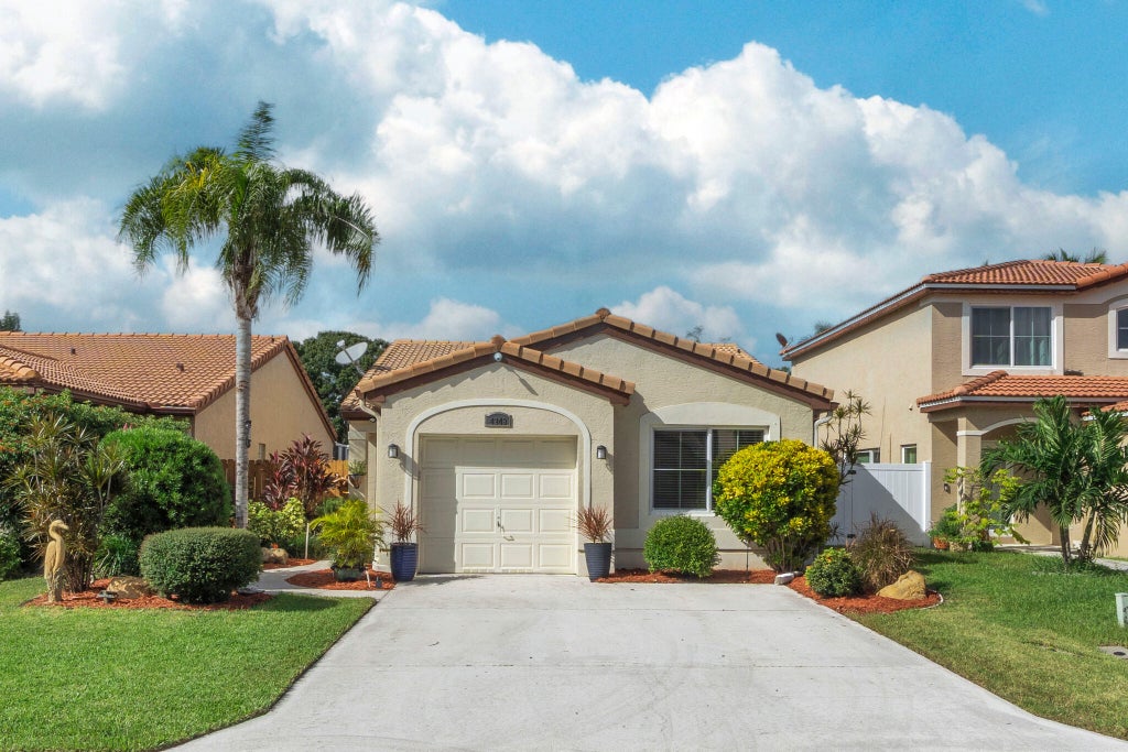 Photo of 4249 NW 1st Drive, Deerfield Beach, FL 33442 (MLS # B26080291)