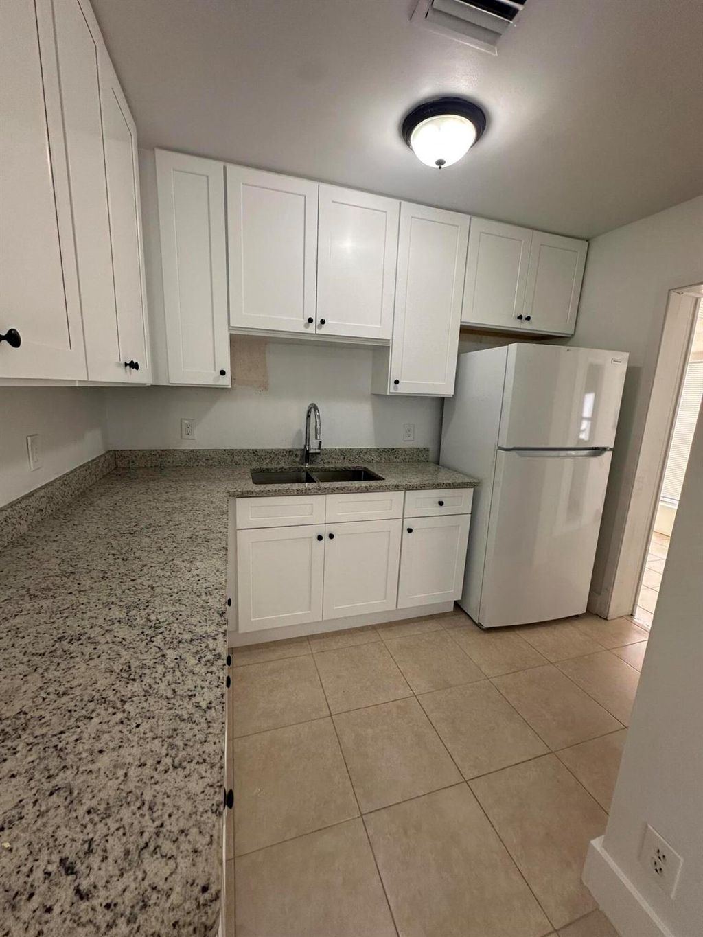 Photo of 410 44th Street, West Palm Beach, FL 33407 (MLS # R11088653)