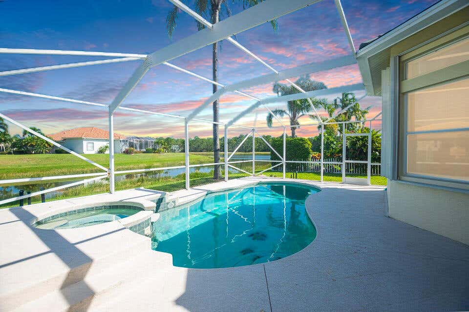 Photo of 199 NW Magnolia Lakes Boulevard, Port Saint Lucie, FL 34986 (MLS # R10989270)