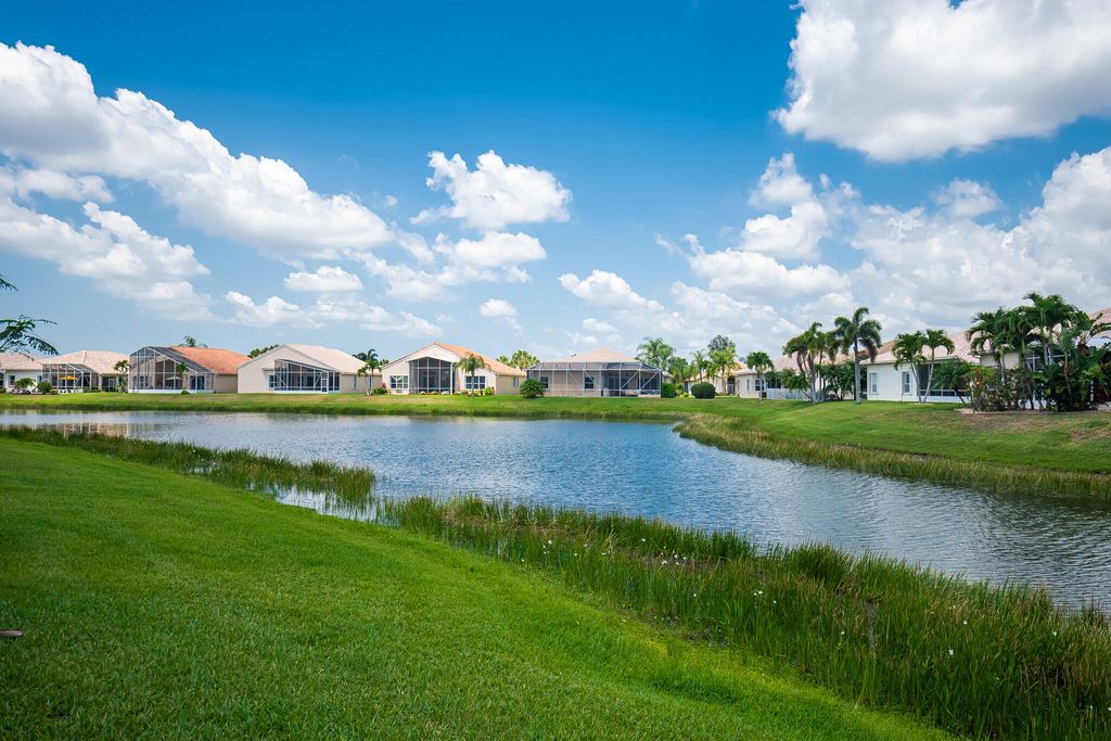 Photo of 199 NW Magnolia Lakes Boulevard, Port Saint Lucie, FL 34986 (MLS # R10989270)