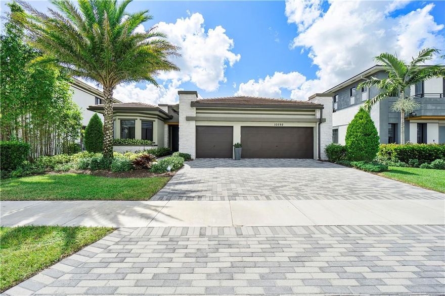 Turn key ready !! Former model! Home is being sold with  all furniture, lighting  and accessories! This 4 bedroom 3 bath  waterfront  home has a three car garage and located in  Presidential Estates of sought after Cascata. Amenities include  wood grain porcelain tile,  large Quartz island with all  white kitchen cabinets and   SS appliances. Tropical ambiance  patio area with palms, lush  plants,  shrub hedges, and aluminum railing for plenty of privacy and complete patio furniture included. Room for a private pool. Exterior and interior have designer paint in today's colors!  Front door offers glass double panels with impact windows.  Too many upgrades to list.  This guard gated community has 2 clubhouses, resort style pools, tennis and much more. Top schools.