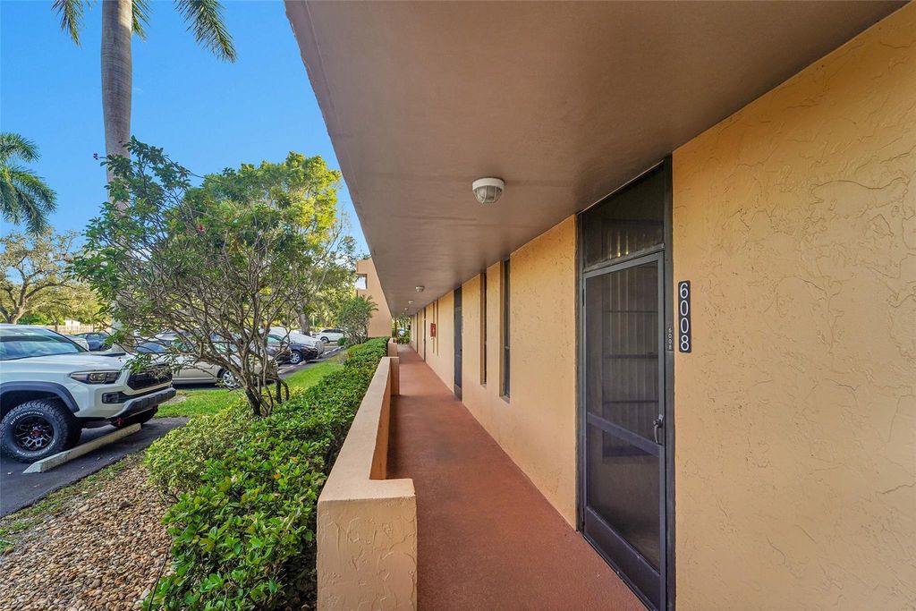 Photo of 6008 Coral Lake Dr #108, Pompano Beach, FL 33063 (MLS # F10538365)