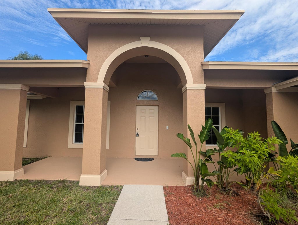 Photo of 3514 SW Zullo Street, Port Saint Lucie, FL 34953 (MLS # R11110052)