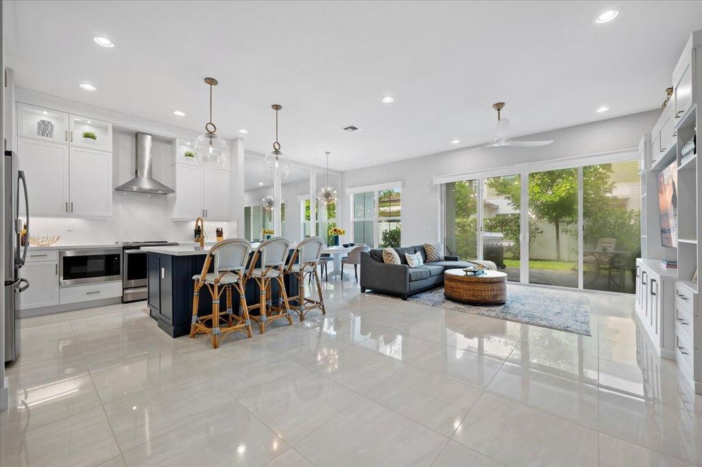 Photo of 4949 Pointe Midtown Way, Palm Beach Gardens, FL 33418 (MLS # R10995594)