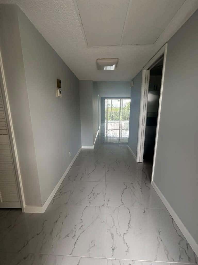 Photo of 2661 S COURSE Drive #306, Pompano Beach, FL 33069 (MLS # B26068854)