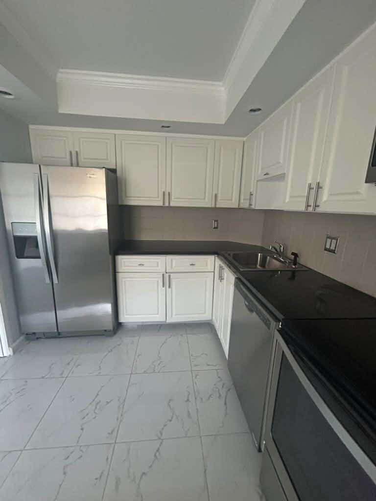 Photo of 2661 S COURSE Drive #306, Pompano Beach, FL 33069 (MLS # B26068854)