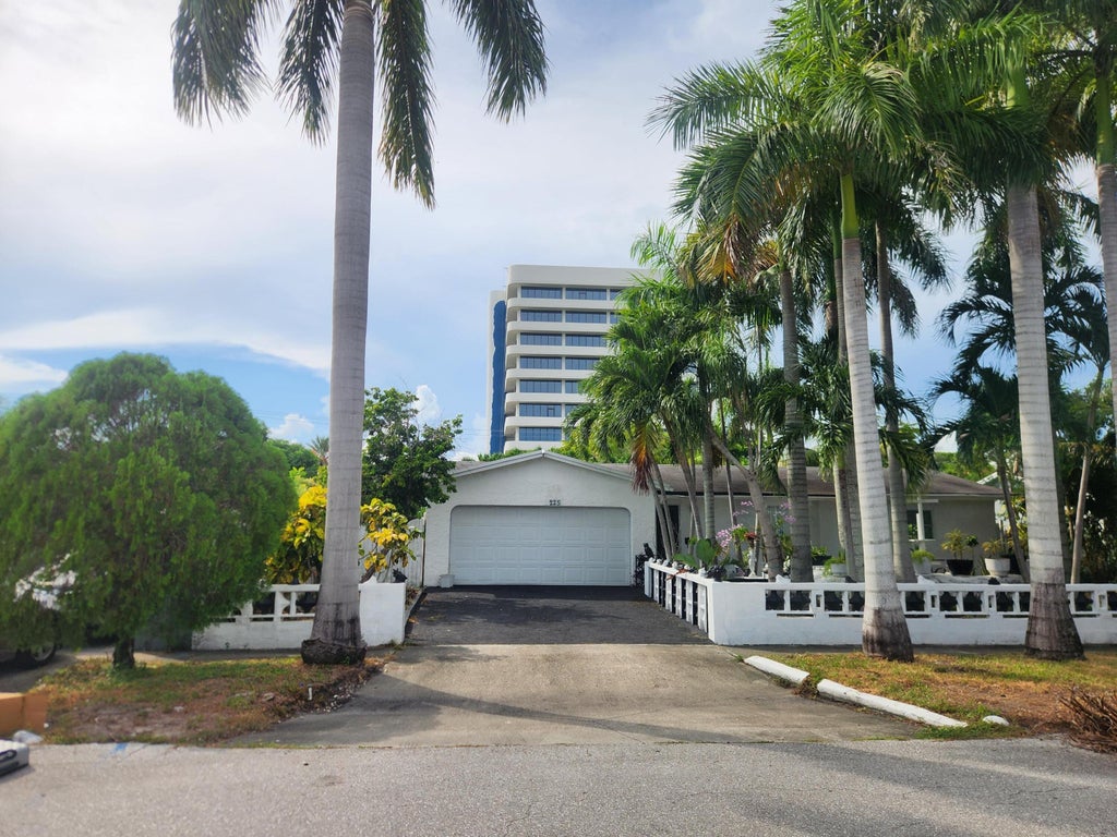 Photo of 225 S SEQUOIA Drive, West Palm Beach, FL 33409 (MLS # B26073484)