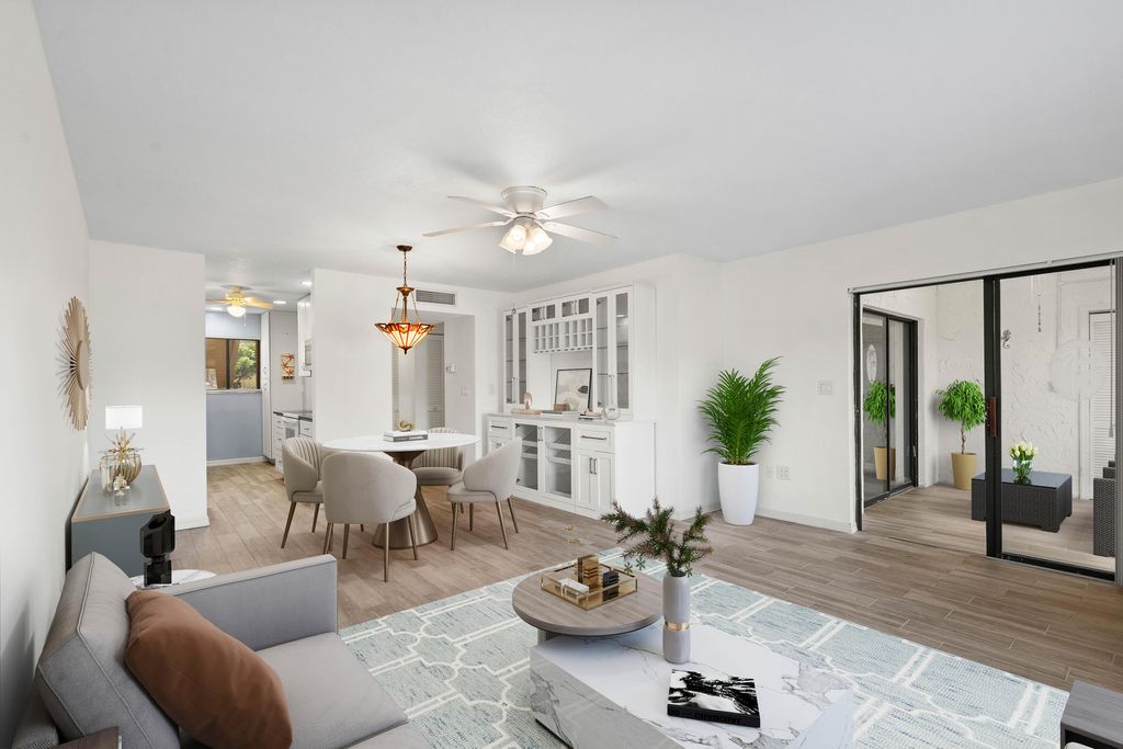 Photo of 5373 SE Miles Grant Road #C-105, Stuart, FL 34997 (MLS # B26022330)