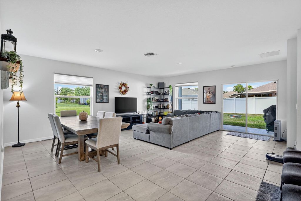 Photo of 435 SW Fields Avenue, Port Saint Lucie, FL 34953 (MLS # R11117433)