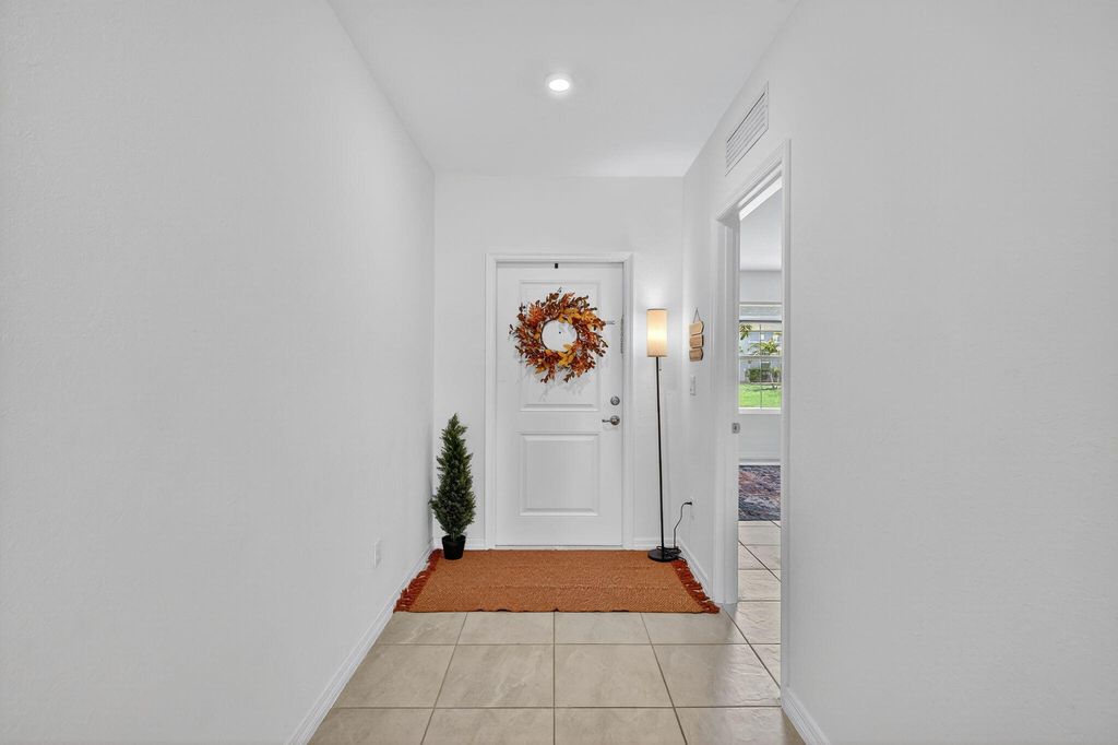 Photo of 435 SW Fields Avenue, Port Saint Lucie, FL 34953 (MLS # R11117433)