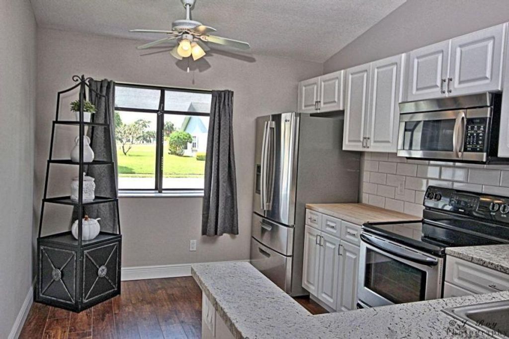 Photo of 125 Moccasin Trail S, Jupiter, FL 33458 (MLS # R11122655)