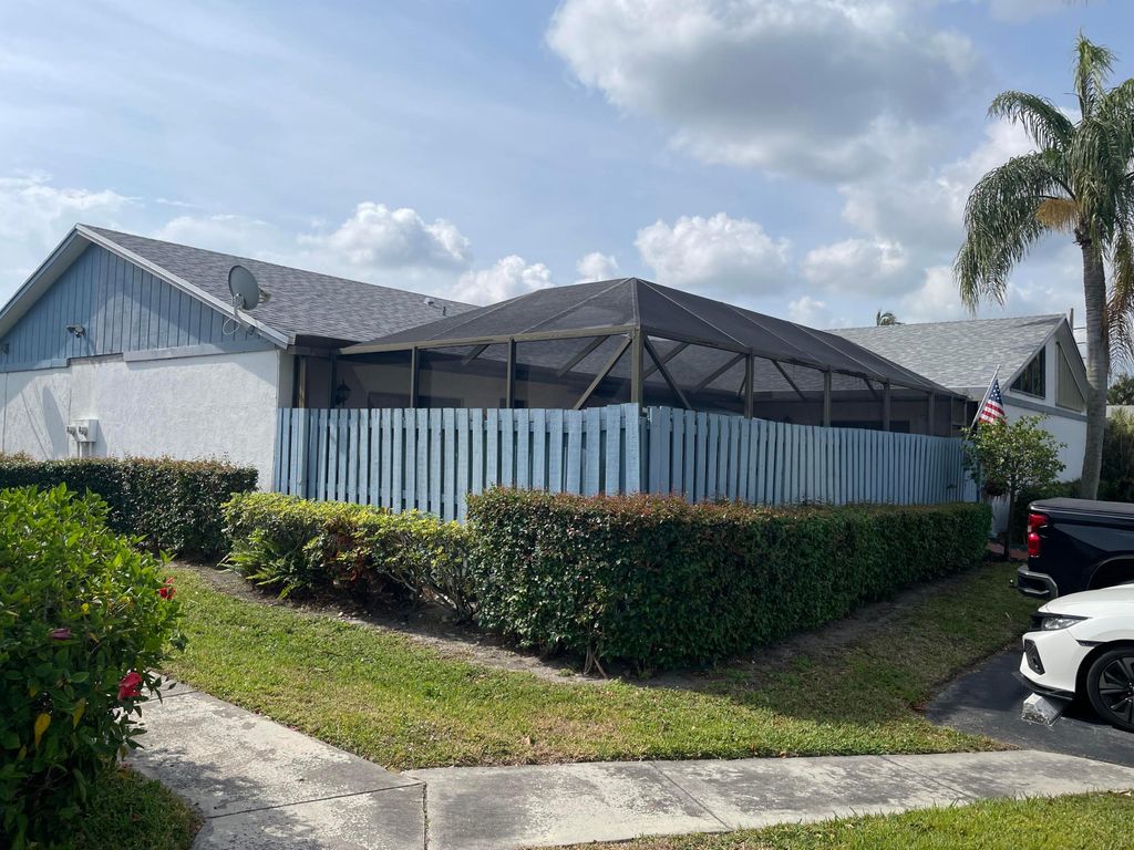 Photo of 1301 Timberlane Circle, Greenacres, FL 33463 (MLS # R11074847)