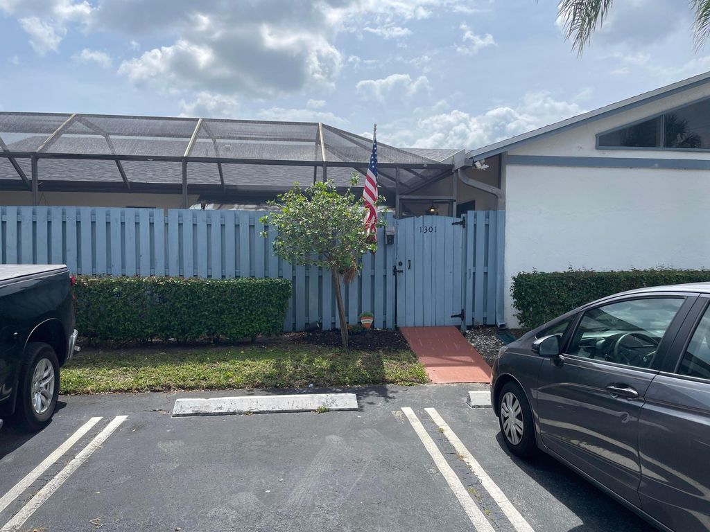 Photo of 1301 Timberlane Circle, Greenacres, FL 33463 (MLS # R11074847)