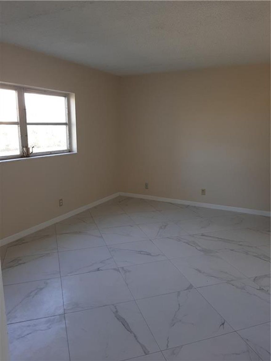 Clean vacant 2 bedroom 2 bath apartment with new appliances and new tile floor. There is also a dedicated parking space and storage locker included. Association property features a number of amenities including 2 beautiful pools and fitness center. Water and cable are included in the quarterly association fee. *** This is a 55+ condominium association.