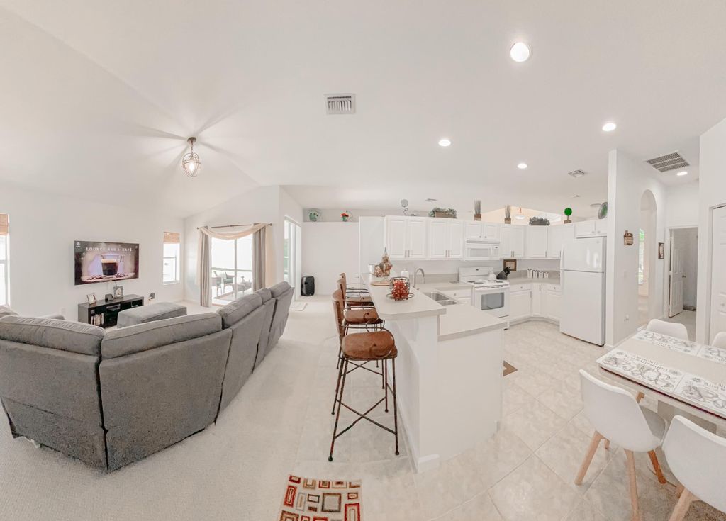 Photo of 2491 SW Import Drive Dr, Port St Lucie, FL 34987 (MLS # R10804106)