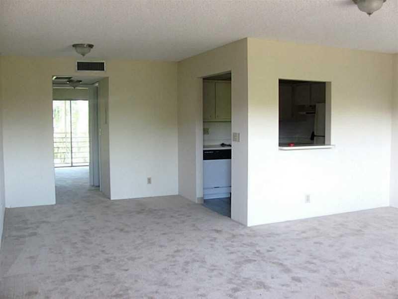 Photo of 2000 SPRINGDALE Boulevard #311, Palm Springs, FL 33461 (MLS # B26078310)